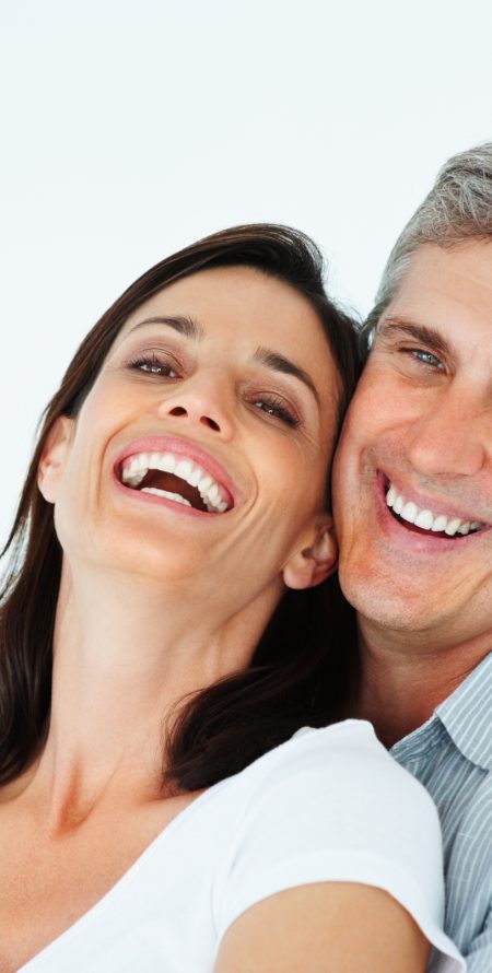Close-up of a mature couple laughing